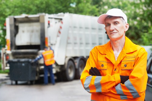 Garden maintenance with waste removal equipment in Teddington